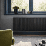 radiateur à inertie comparatif fonte anthracite sous fenêtre