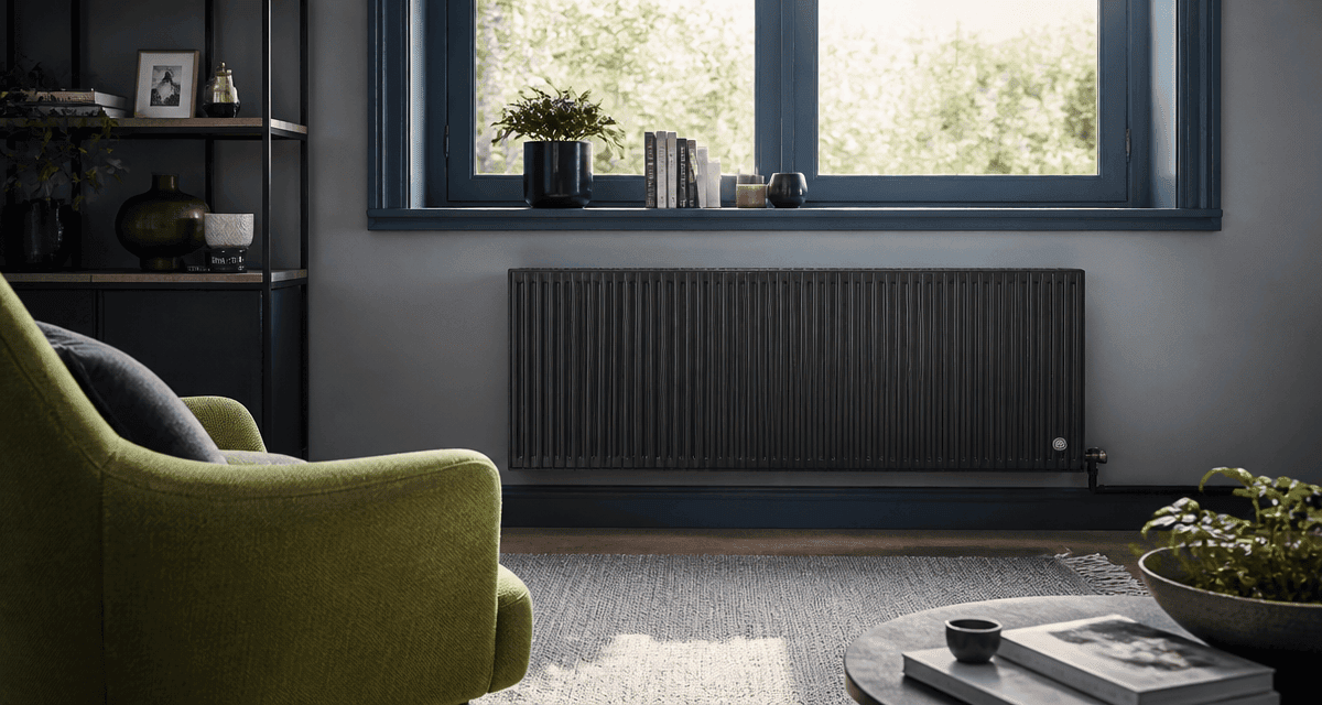radiateur à inertie comparatif fonte anthracite sous fenêtre