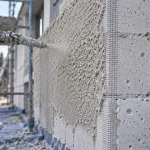Siporex enduit exterieur monocouche projeté sur mur extérieur